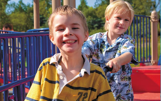 two brothers on a byo commercial playground