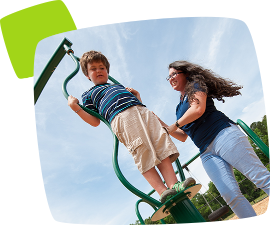 boy on metal spinner bars - safety first